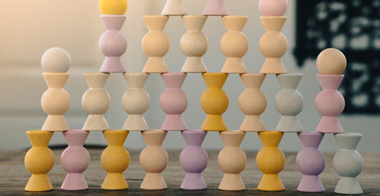 Chill Pepper Sweets wooden stacking game shown in a pyramid build on a table in an old Dutch farmhouse