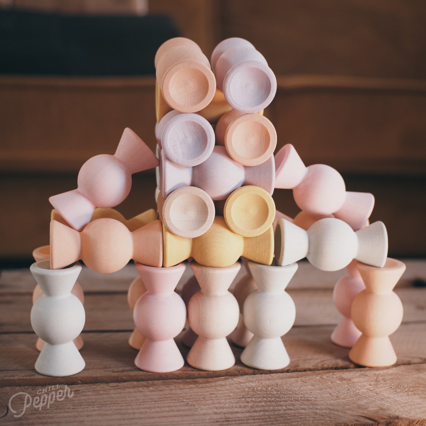 Chill Pepper Sweets Wooden Stacking - A castle tower built with the wooden sustainable pieces